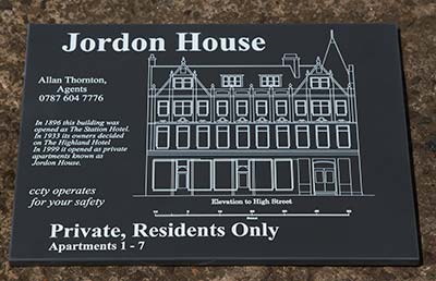 Engraved plaque with fine detail.