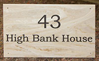 Plaque engraved using marble corian.