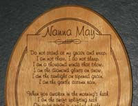 engraved oval wood plaque
