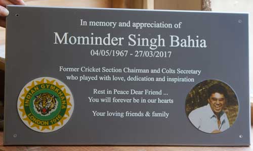 Engraved corian plaque with full colour inserts