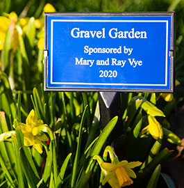 Plaque holder with blue aluminium engraved plaque.