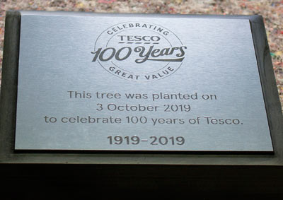 Stainless steel effect engraved acrylic plaque on granite plinth