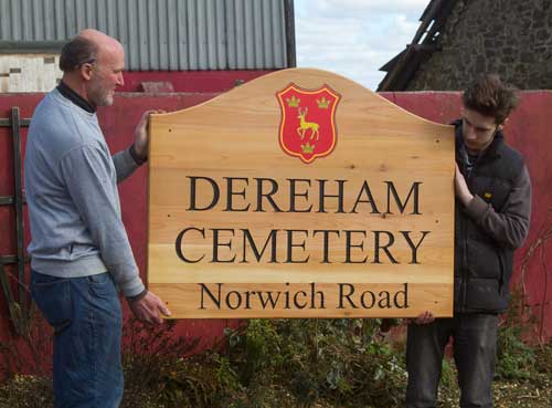 Cemetery sign using red cedar wood with full colour anodised aluminium insert