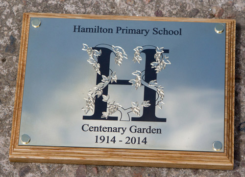 Engraved brass sign