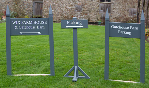 Signs for holiday cottage complex.