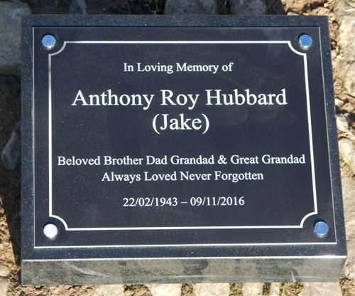 Black aluminium memorial plaque on black granite wedge