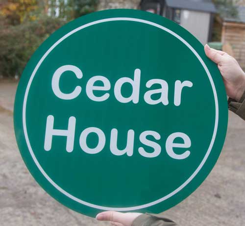 Round Value Home Sign