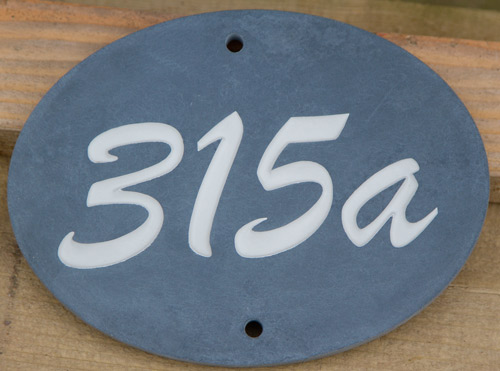 Oval slate house number sign