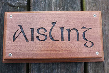 Wooden celtic house sign made in sapele wood. Font - Celtic Plain - ref 1907.LW.139