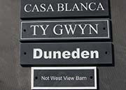 Slate signs in all shapes and sizes.