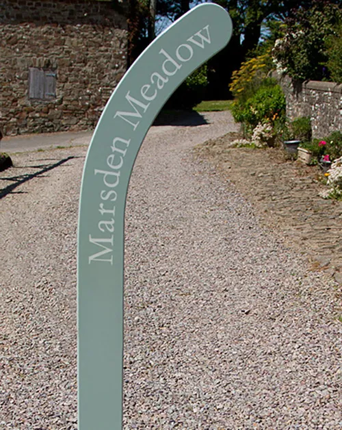 Painted wooden hockey stick sign