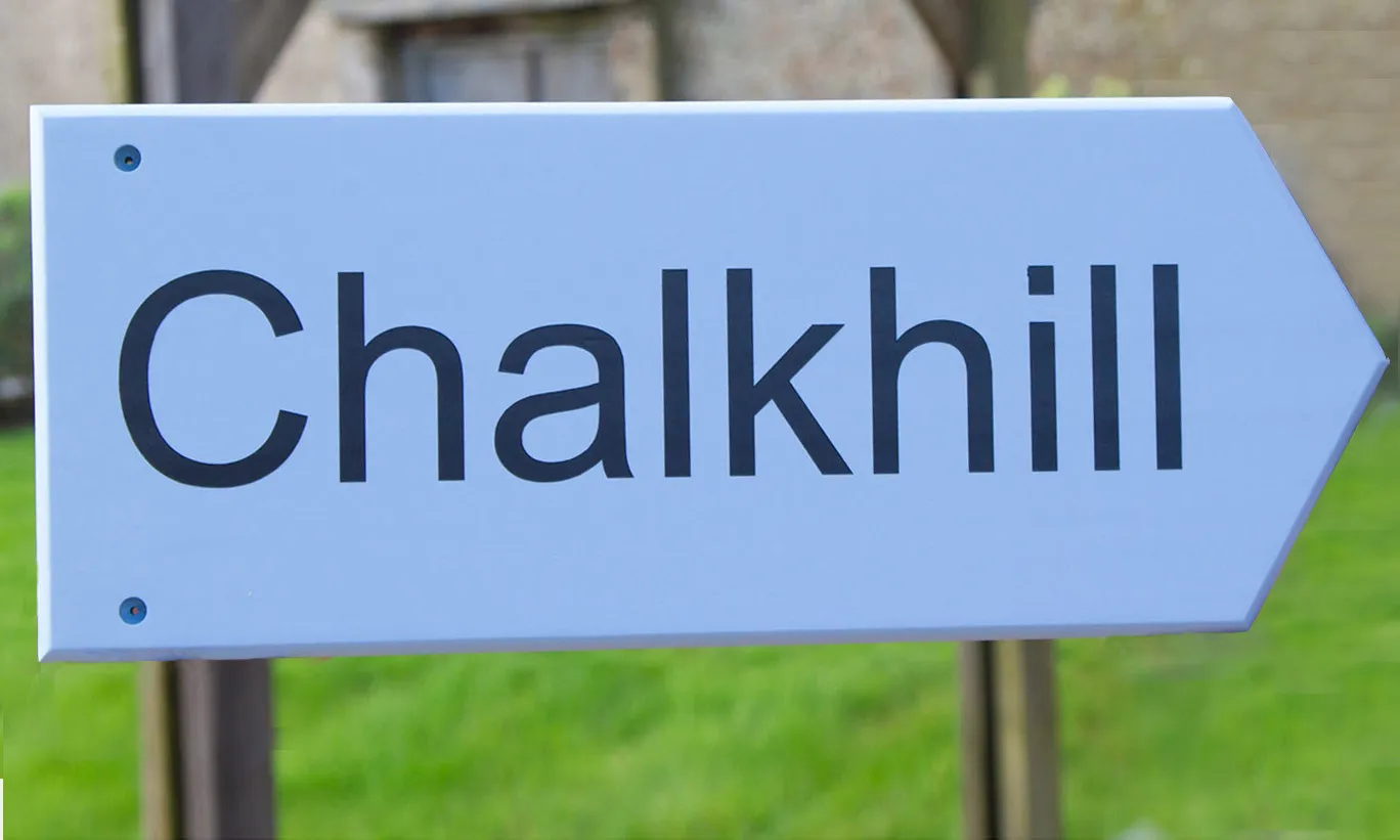 title here Farrow and Ball Lulworth blue painted arrow sign