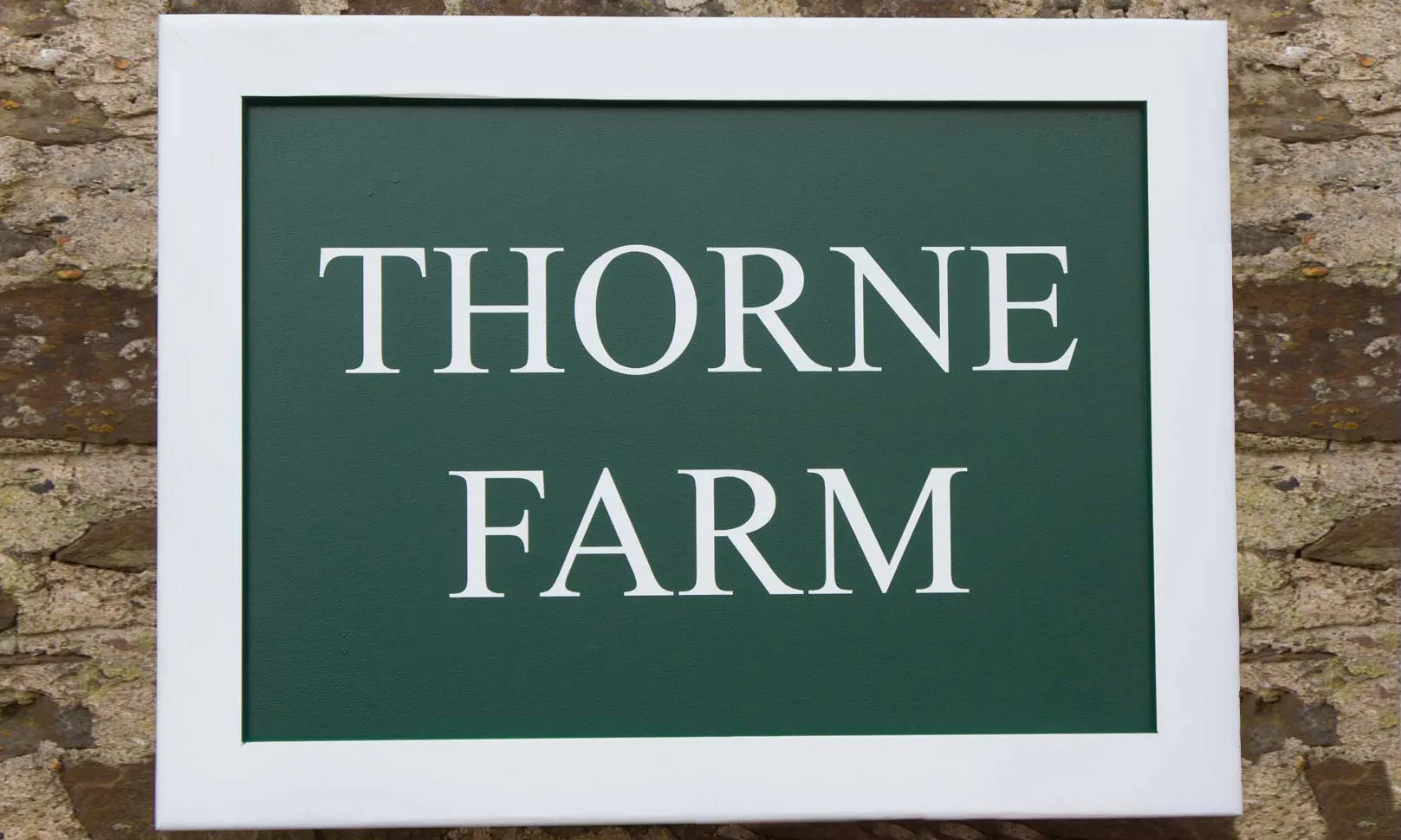 title here Sugn mainted in Moss Green with white letters