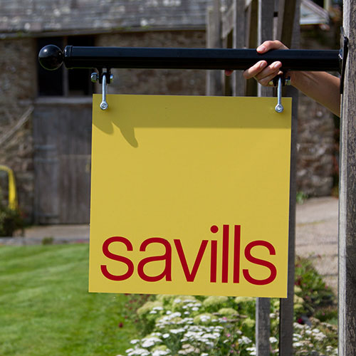 title here Business signs crafted in a variety of colours and materials.