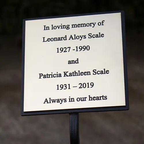 title here Brass memorial plaque with tree stake