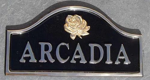 Cast Brass Sign with Rose Motif