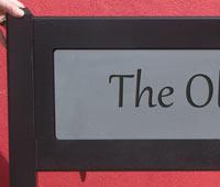 Solid Oak entrance sign with engraved insert