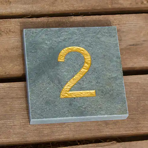 green slate house number sign