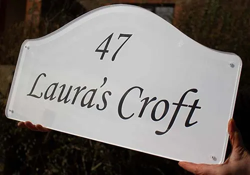 The black lettering with the sandblast effect backgruond is the most popular combination. Shaped Acrylic Signs