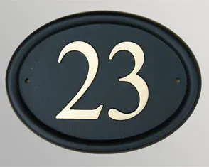 title here Cast house number sign
