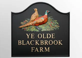 title here LArge dome top cast house sign with motif