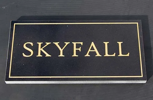 title here Granite House Sign