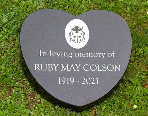 The image was laser etched. Heart Shaped Granite Wedge