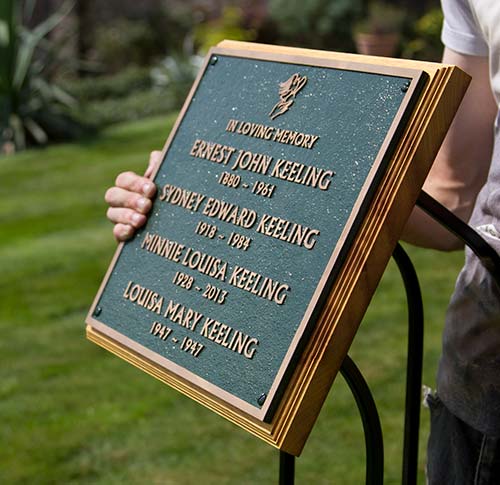 Bronze memorial with plaque stand