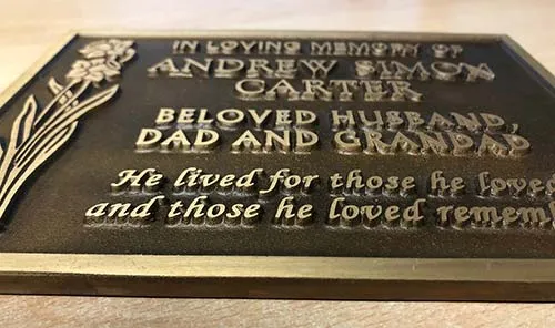 You can clearly see the raised lettering on this plaque. Cast Bronze Lettering