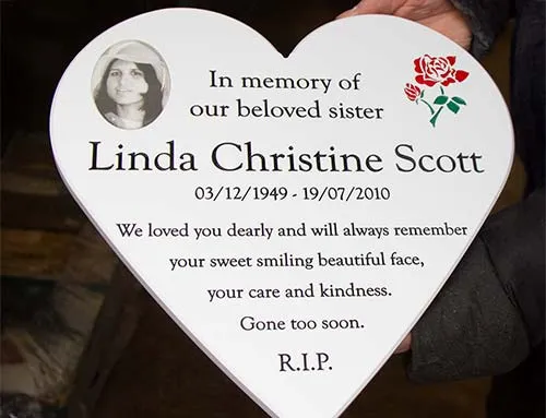 The photo was made from porcelain White Engraved Corian Heart with Photo