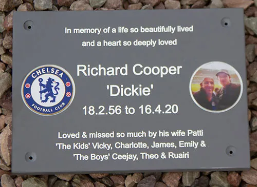 These two round porcelain plaques were inset into slate grey corian. Round Photo Memorials