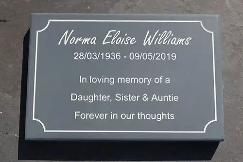 We have a large range of fonts to choose from. Slate Memorial with Indented Border