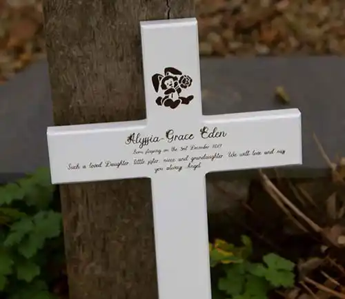 Memorial crosses can be painted or natural wood. White Painted Childs Cross