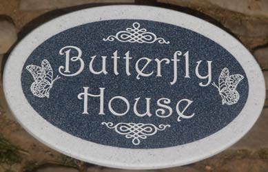 Oval shaped house sign