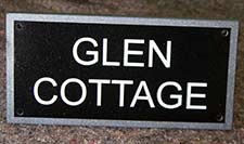 Granite house name plate with the edge sand-blasted.