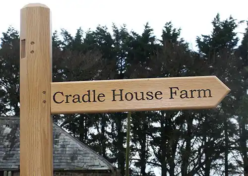 Octagonal wooden finger post