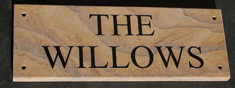 Sandstone is an unusual stone for house signs
