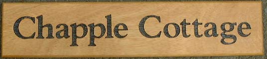 Wooden Sign with Lettering