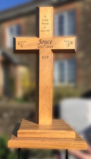 Wooden memorial cross  on plinth