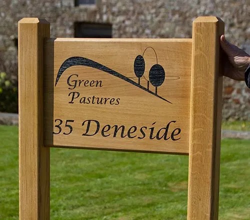 These are sent out with the posts fixed. Oak Sign Morticed into Oak Posts