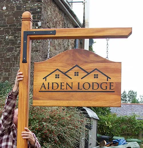 This post has an extra support bracket due to size of sign. Iroko Post and Arm