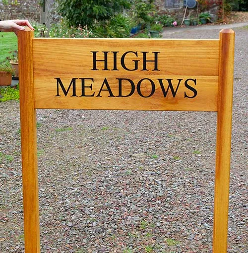 This Iroko entrance sign was fixed with morticed joints. Iroko Entrance Sign.