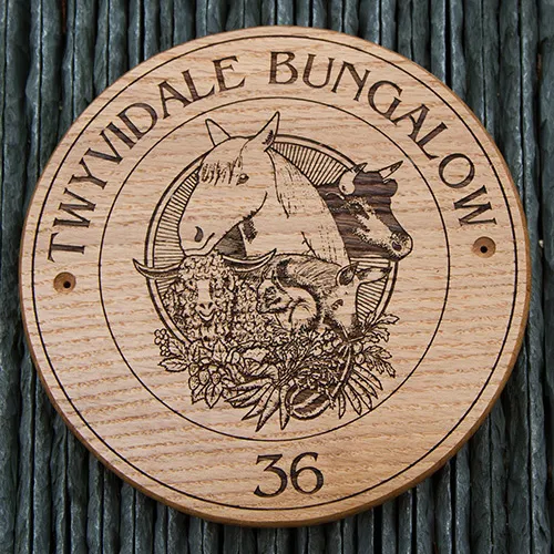 title here Round wooden sign