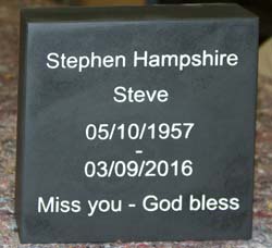 Small thick slate memorial.