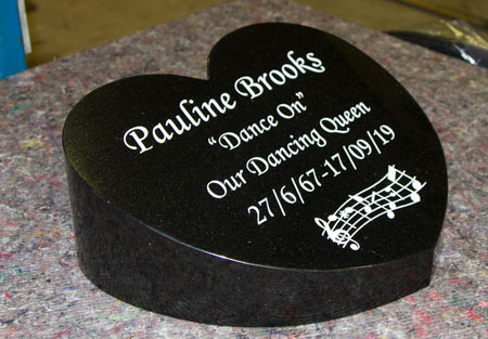 A black granite heart wedge makes for a beautiful memorial stone.