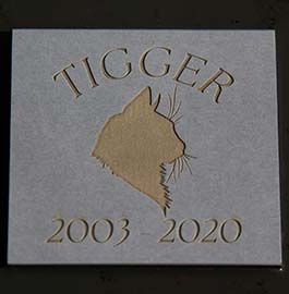 Unpainted cat memorial plaque in pewter paperstone.