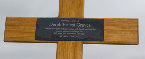 Oak cross with rustic slate plaque attached.