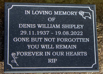Memorial plaque with meaningful motifs.
