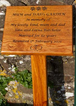 Wooden memorial treated with three coats of Osmo Oil.