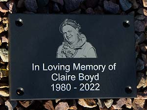 Deep engraved latters with laser etched photo.